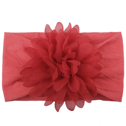 Handcrafted chiffon flower baby headband for little princesses, available in various colours and styles.