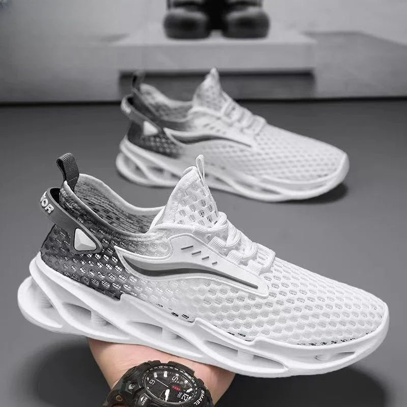 Breathable mesh running shoes with lace-up closure, available in black, white blue, and white grey colors