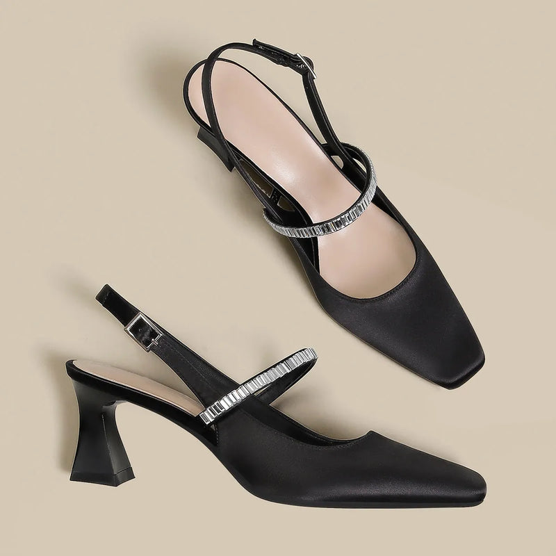 Women's black stiletto high heels sandals with pointed closed toe and buckle strap closure, 3-5cm medium heel height in sizes 33 to 40 available in black and white colour options with rubber sole construction