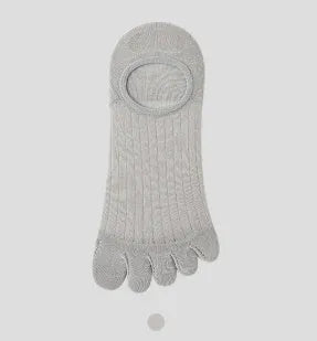 Pair of solid colour modal five-finger socks laid flat, showing toe separation and thin fabric texture.