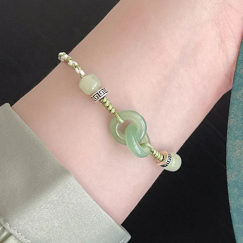 Green jade colour woven women's bracelet with a copper peace buckle and double ring design
