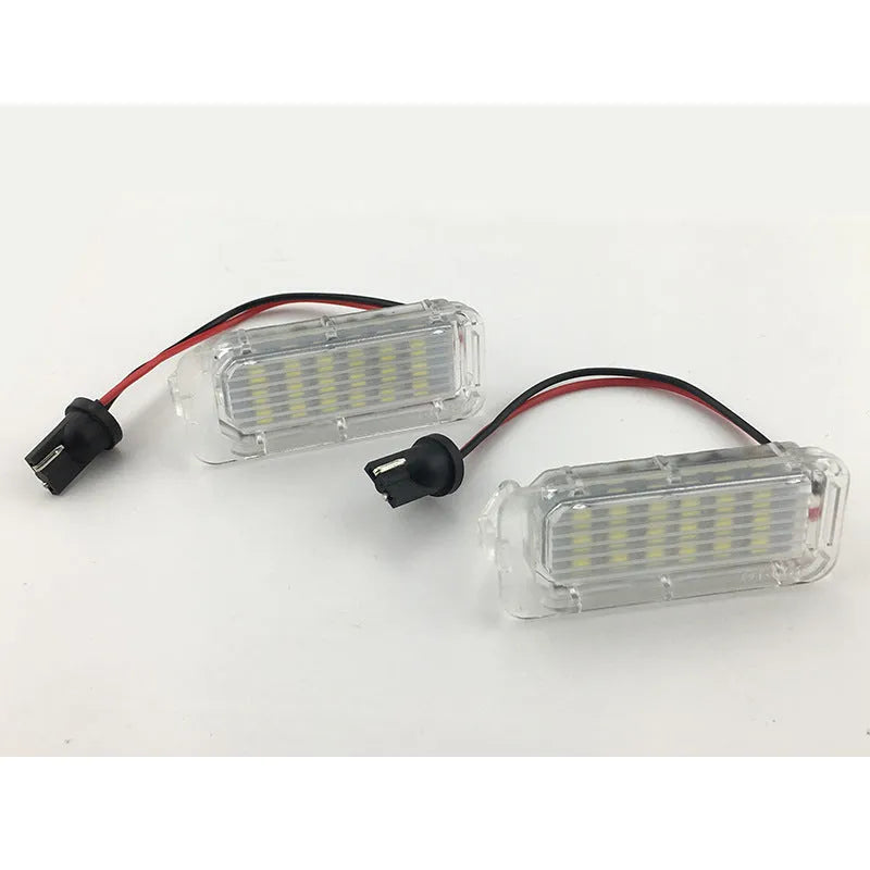 White 12V license plate lamp pair for Ford Focus Fiesta Mondeo with 6500K output and PC body
