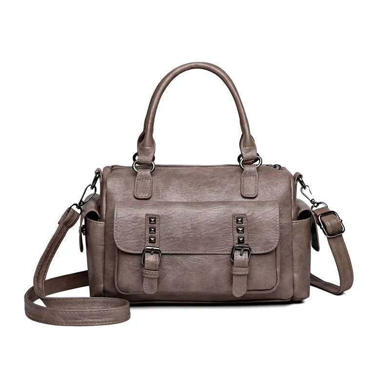 Vintage style messenger bag in PU leather with contrast stitching, horizontal square shape, shown in multiple colour options