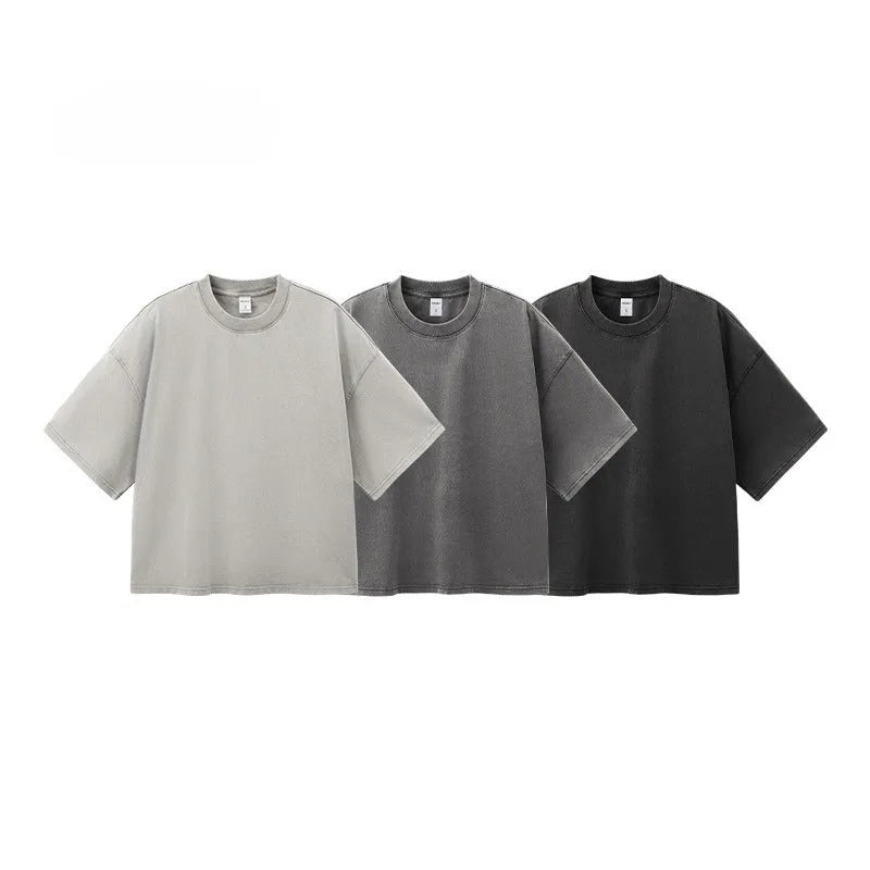 Men's vintage cotton t-shirt with loose fit, drop-shoulder sleeves, and washed-out finish in khaki light colour