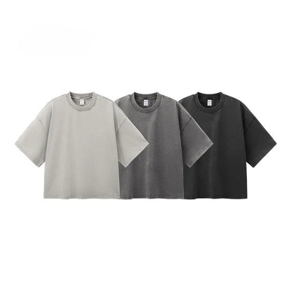 Men's vintage cotton t-shirt with loose fit, drop-shoulder sleeves, and washed-out finish in khaki light colour