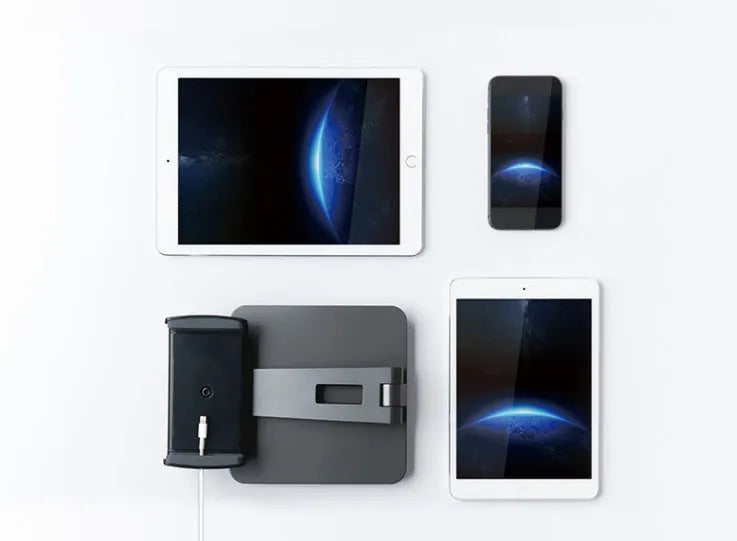 Silver folding phone and tablet stand holding a device, showing its 360-degree rotation and compact size