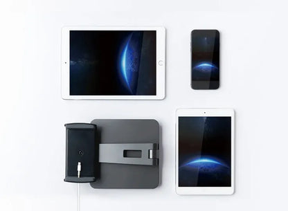 Silver folding phone and tablet stand holding a device, showing its 360-degree rotation and compact size