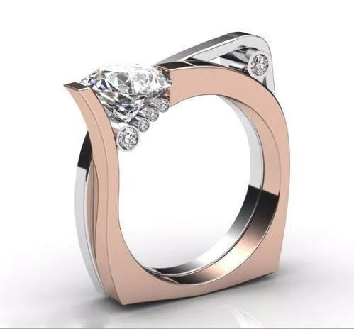 Rose gold geometry design women's ring with zircon stone centre, showing angular facets and electroplated finish