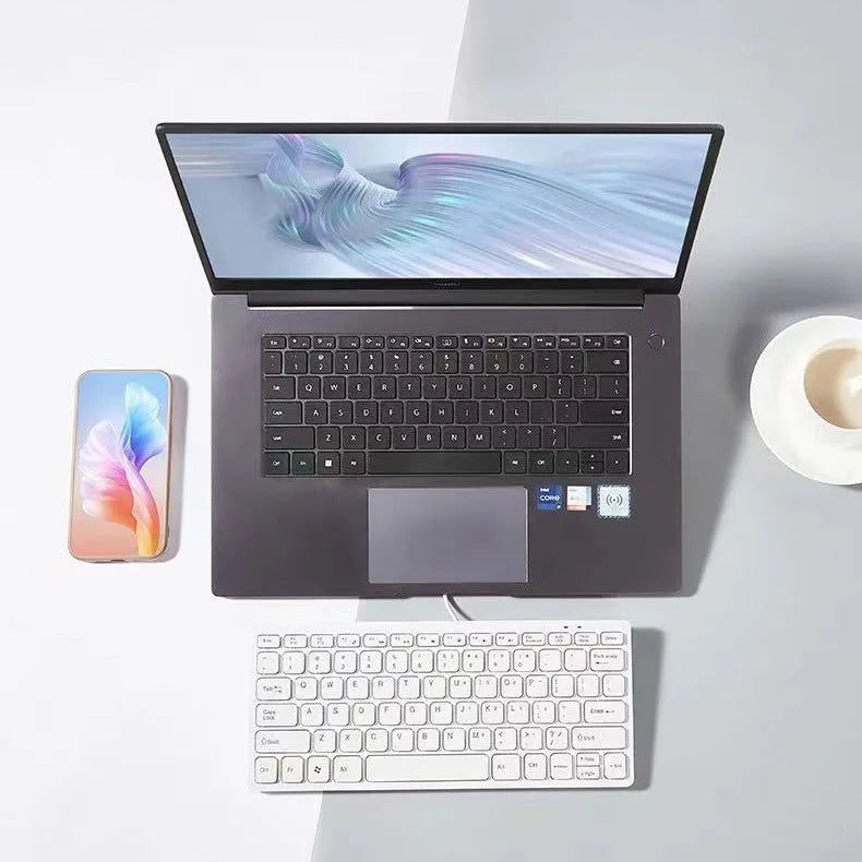 USB wired mini keyboard in four colour options showing compact 280mm design