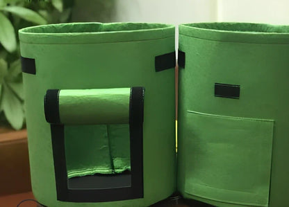 Black non-woven plant growth bag with side window and handles for potato gardening, breathable fabric, large size shown