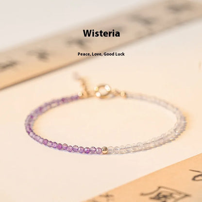Women's geometric crystal bracelet with cut facets and spherical sections in 2mm purple rattan style.