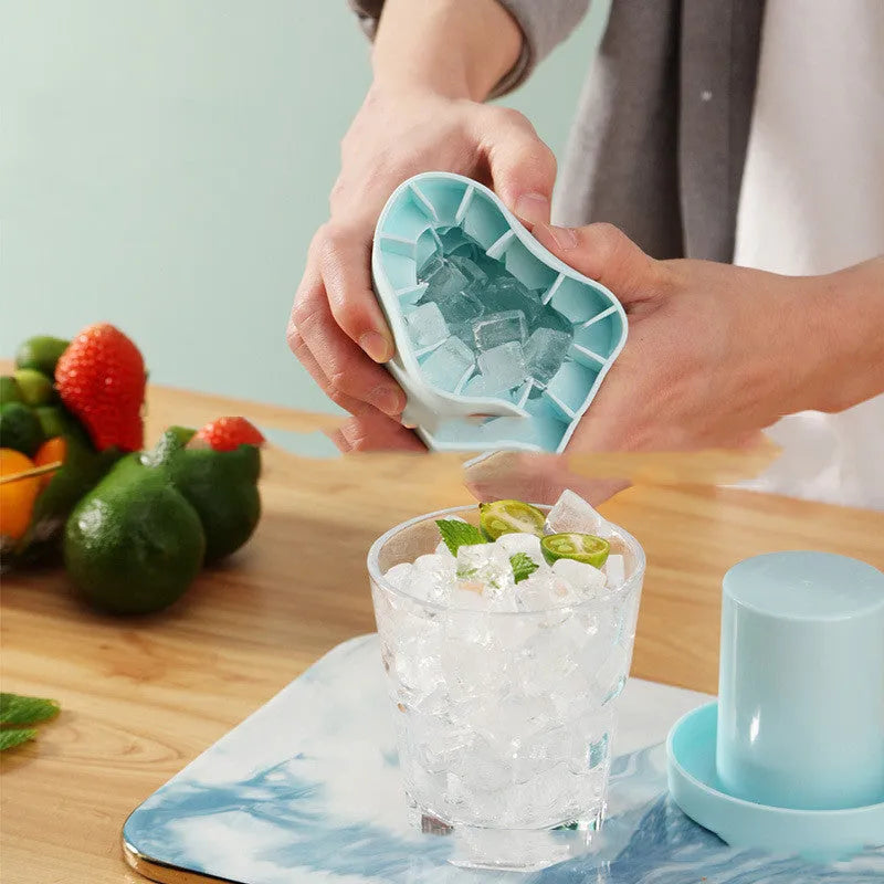 Blue-green silicone ice bucket mould with lid showing 9cm diameter and 8cm height dimensions