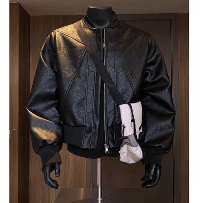 Man wearing a long black PU leather jacket with a litchi grain texture, showing its extended 100cm length and tight fit.