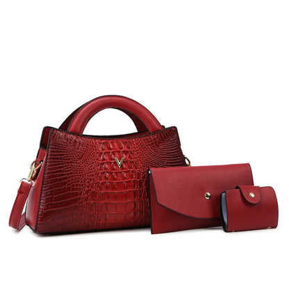 Women's square crossbody bag in crocodile pattern PU leather, showing internal organiser pockets.