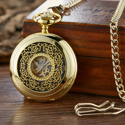 Retro mechanical pocket watch with floral print dial and transparent case back showing movement