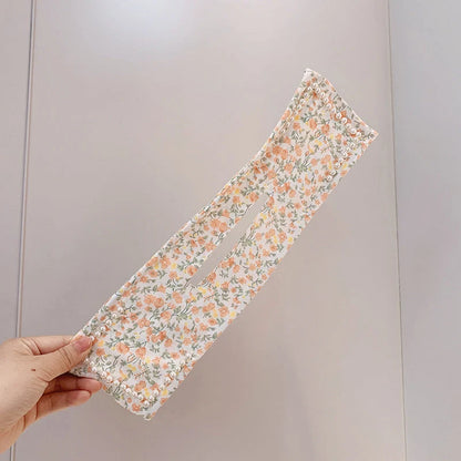 Women's elegant cloth headband with diamond or pearl accents for stylish hairstyles