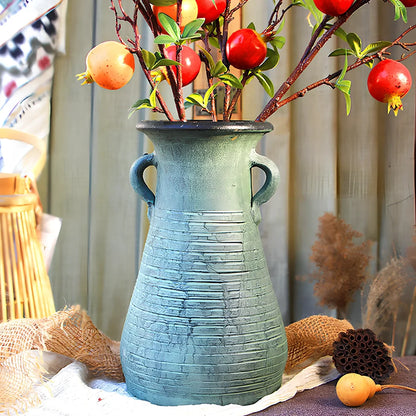 Ceramic mosaic vase with dried flower arrangement, handcrafted surface detailing