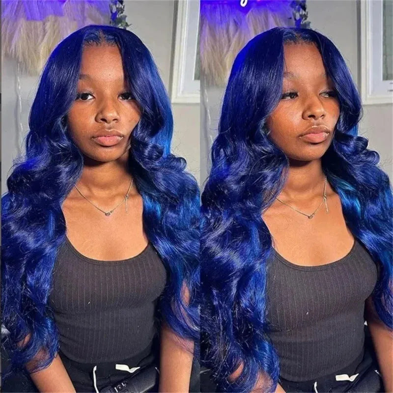 Dark blue long curly synthetic wig with big waves on a wig stand, showing middle parting.