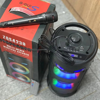 Black portable Bluetooth speaker with dual horn cannon design and wheat-coloured elements