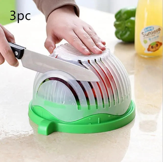 Blue salad cutter bowl showing cutting lid with seams, drain basket function, and reversible base plate