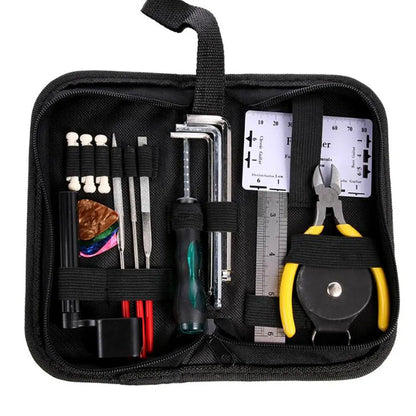 Black guitar repair kit case measuring 200x100x45mm containing metal and plastic tools for instrument maintenance