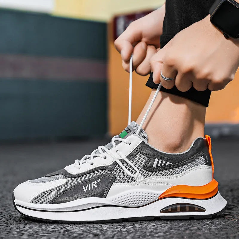 Men's gray and black mesh running shoes with EVA sole and round toe design
