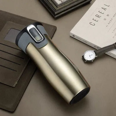 Black vacuum insulated stainless steel travel flask with push-button lid, 450ml capacity.