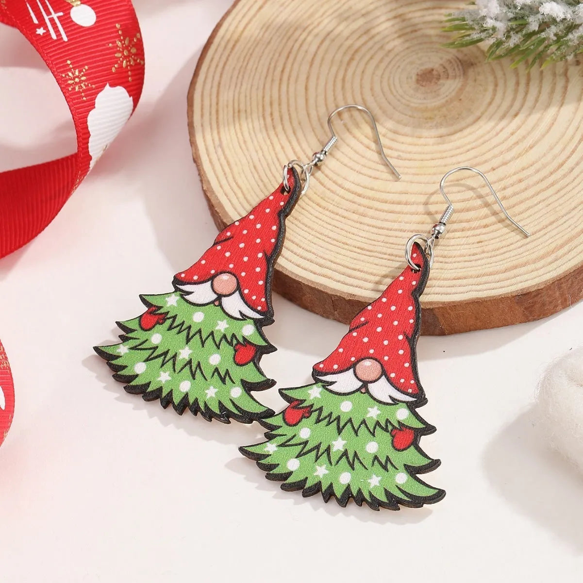 Geometric wooden Christmas earrings with printed Santa Claus motifs in Christmas tree and water drop snowman designs