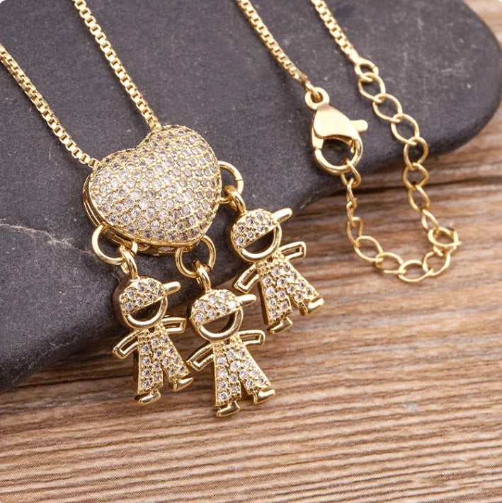 Gold cubic zirconia heart pendant necklace for mothers, symbolising family love.