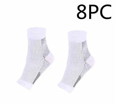 Anti-fatigue compression foot sleeve in black, red, or white, featuring moisture-wicking fabric and a heel hole for breathability.