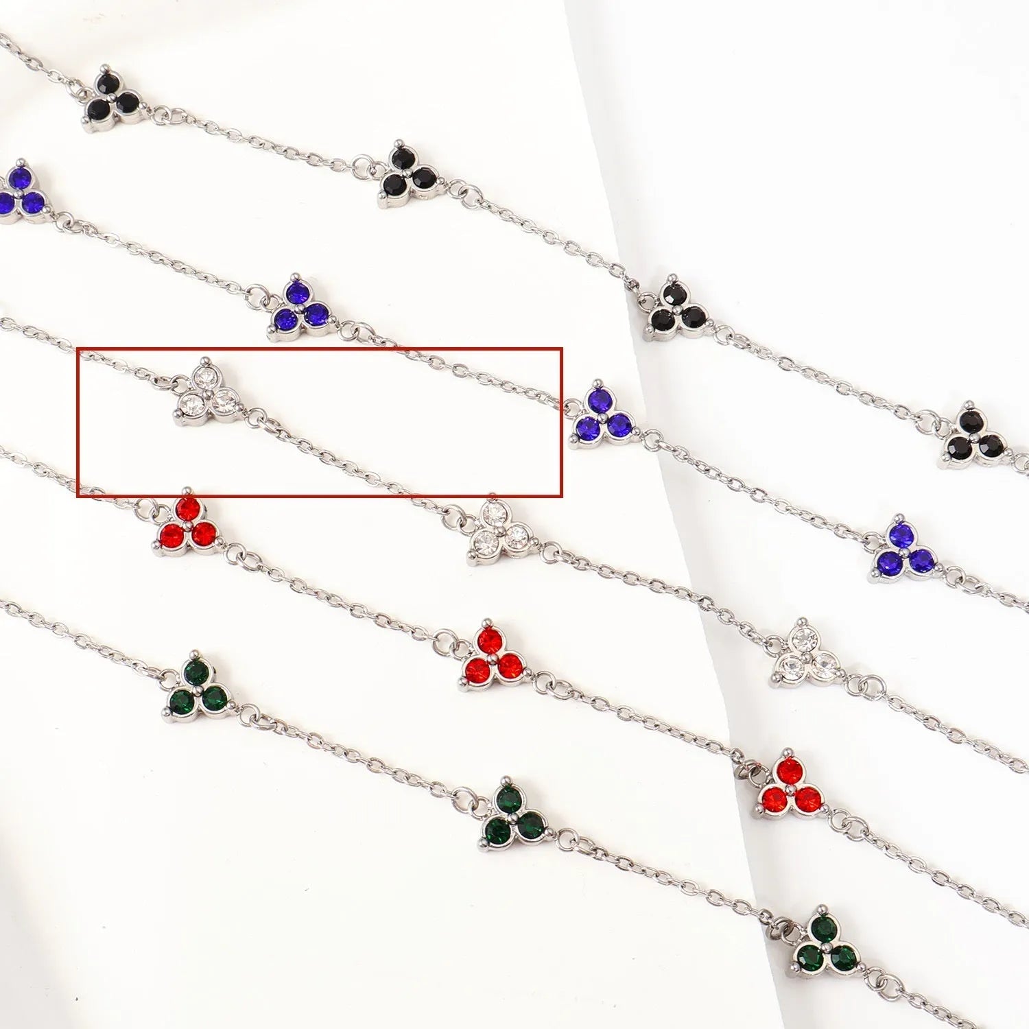 Women's stainless steel three diamond geometric triangular bracelet in gold finish with white zircon gemstones