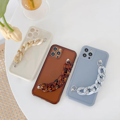 Marble pattern silicone phone case for iPhone with attached TPU bracelet, shown in grey blue colour.