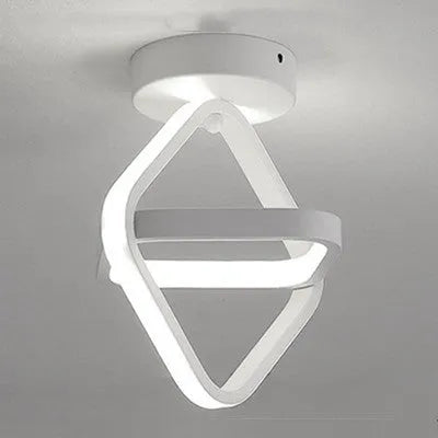 Modern round ceiling light with 21cm diameter and 25cm height in black or white finish