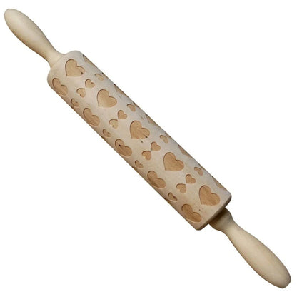 Festive rolling pin with embossed Christmas designs for easy imprinting on dough