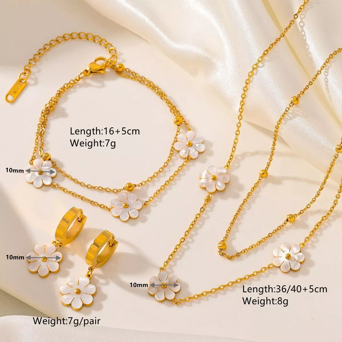 Stainless steel daisy flower jewellery set with necklace, bracelet, and earrings