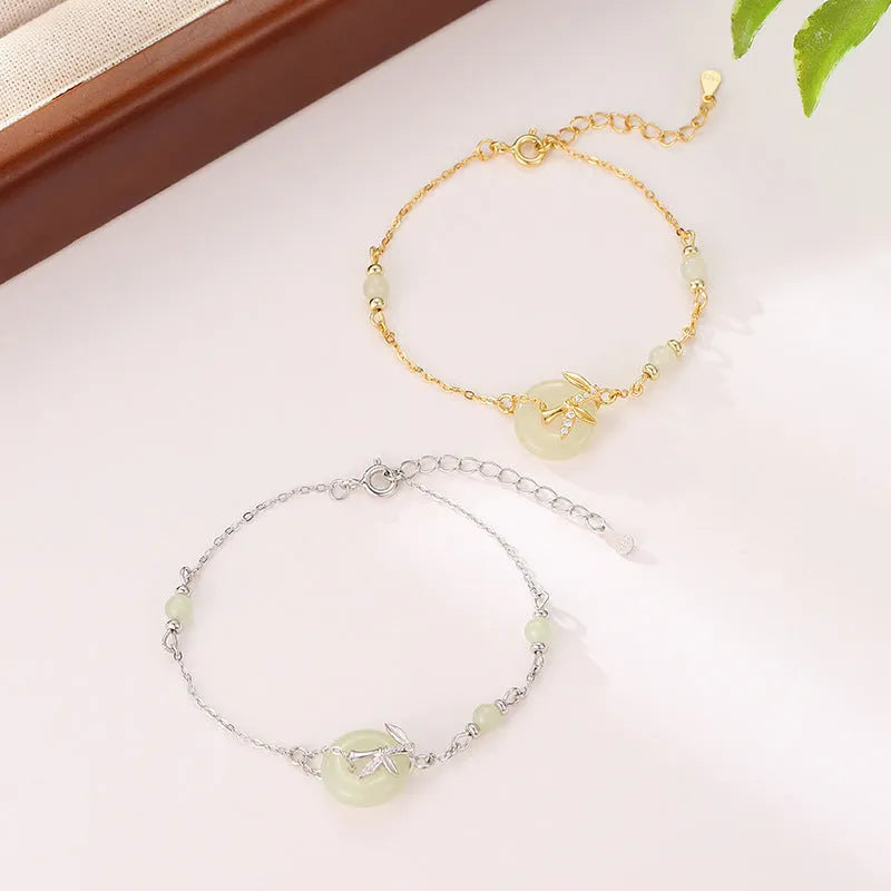 Women's antique style silver bracelet with a safety peace buckle on a 925 sterling silver chain.