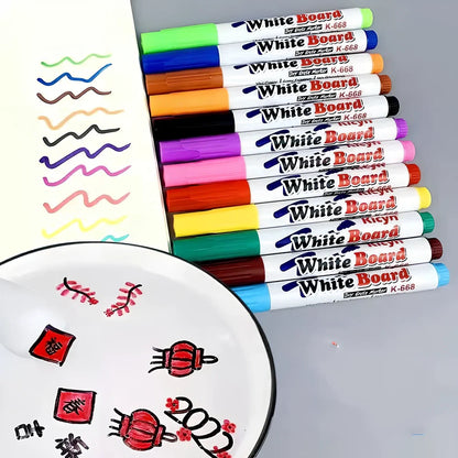 Children's floating water painting pens with oil-based colours and plastic spoon for creating temporary artwork