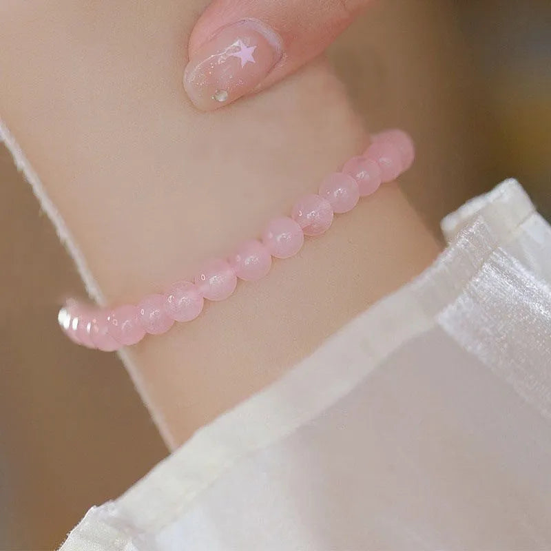 Aquamarine crystal bracelet with pink blue colour and geometric design elements