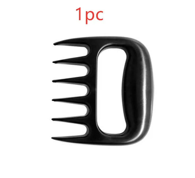 Two black bear claw meat shredding forks with non-slip grips for barbecue preparation