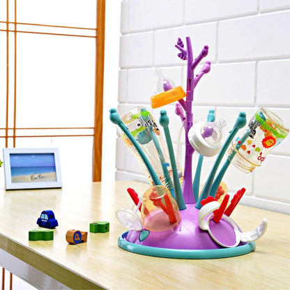 Portable baby bottle drying rack in green and purple, made from safety PP material