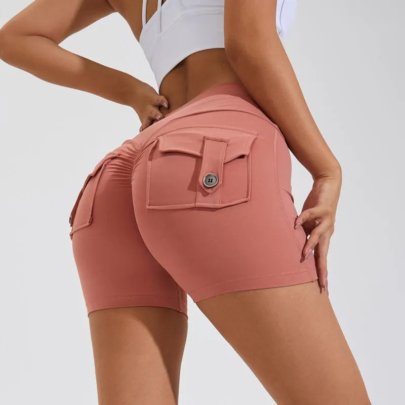 Women's high-waist quick-dry fitness shorts with side pockets in avocado green colour