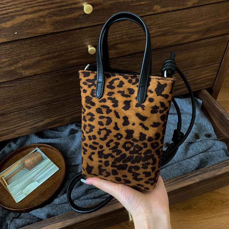 Flowing water bucket messenger bag in contrast colour and leopard print with PU outer and double connector strap