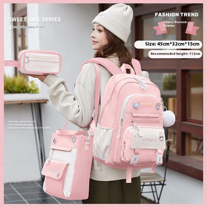Pink waterproof school backpack for girls with curved ergonomic shoulder straps, shown with matching pencil case.