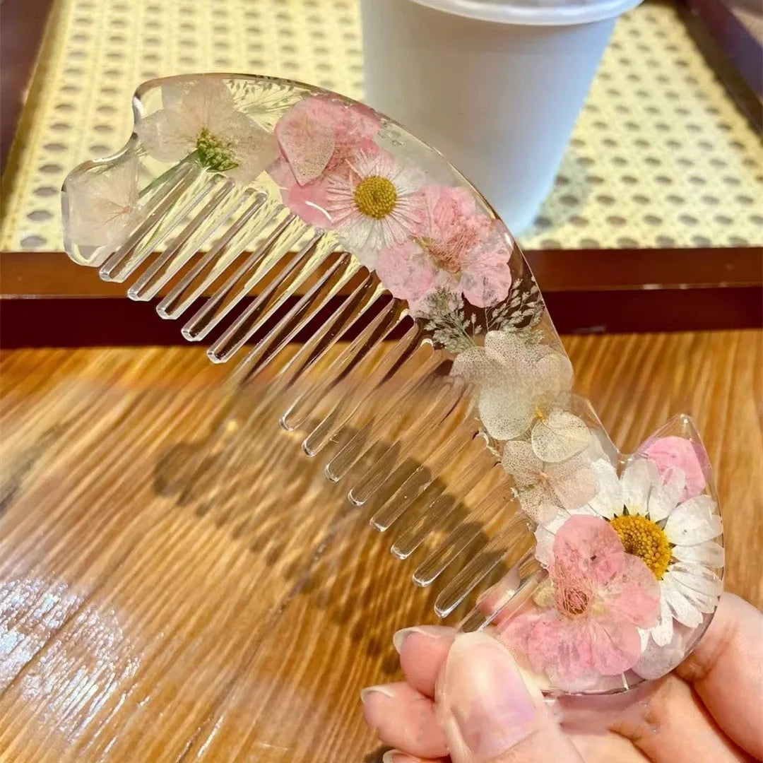 Mirrored glossy resin hair comb in three colour options, measuring under 10cm