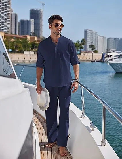 Men's casual cotton suit in a solid colour, featuring a long sleeve top and full-length trousers.