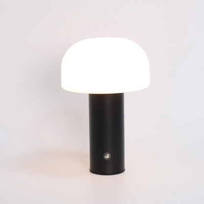 Creative USB table lamp in black with adjustable neck and integrated charging port on base.