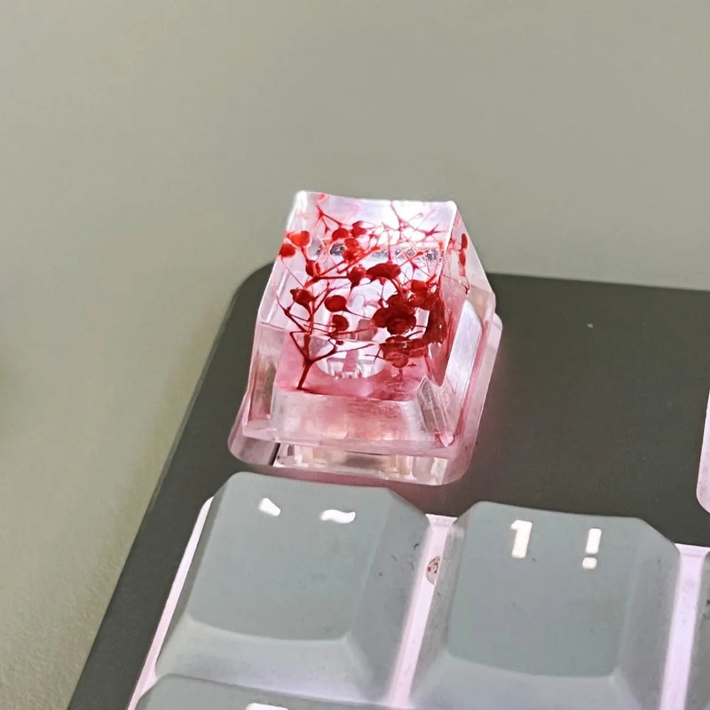 Resin High Transparency Starry Sky Keycap for mechanical keyboards featuring a sparkling glitter effect in a choice of four colours - Red, Pink, Green, or Violet, measuring 1.8*1.2 for a decorative and clear keycap upgrade