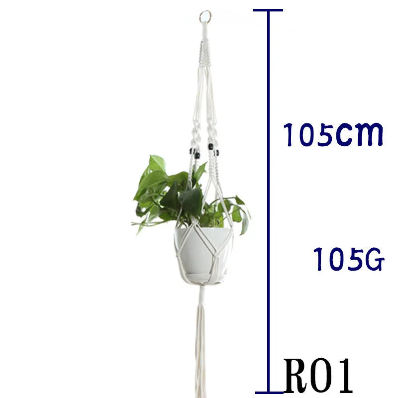 Handmade beige cotton rope net bag holding a plant pot, showing its textured sling design.