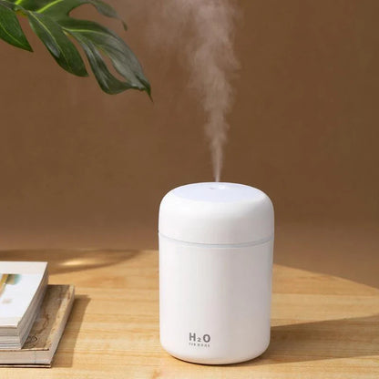 Compact and quiet bedroom humidifier with soothing colour-changing lights for a relaxing sleep environment