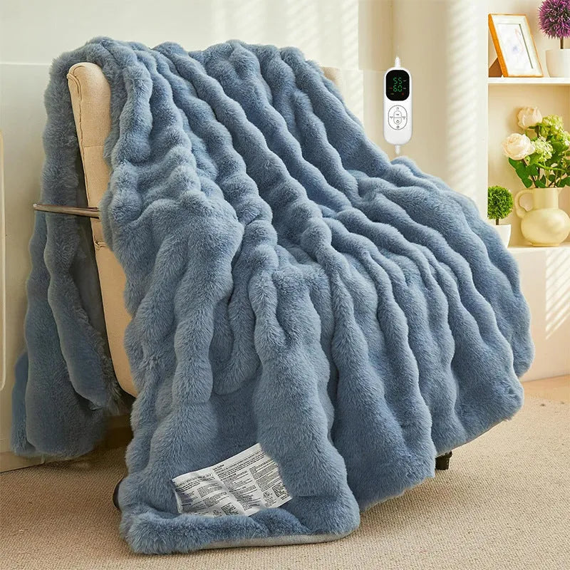 Dark grey far infrared electric heating blanket with carbon fibre elements on a double bed.